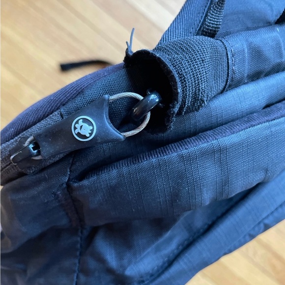 PacSafe travel safe crossbody laptop backpack with camera compartment - Picture 7 of 7